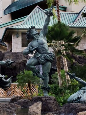 KD/“Kaha ka ‘Io me na Makani” (The Hawk soars with the Winds)                         Hilton Hawaiian Village, Gracefully striding the edge of a waterfall, these three, twice life size figures in bronze are dancing hula kahiko, the ancient style of Hawaiian dance. The two female dancers, the spirits of the wind, represent the dance and chant of Hawaiian hula. Together they are the winds that uplift the mighty ‘Io , the Hawaiian Hawk, the central male dancer, who represents the spirit of Hawai’i poised to take flight.
These images pay tribute to the importance of dance, chant and song in the rebirth and growth of Hawaiian culture. Together they celebrate the power of the hula connecting us with the spirit of the land, the Aina that is Hawaii.
Commissioned by Hilton Hawaiian Village
Completed May, 2001