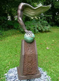 72” x 34” x 24” fountain in bronze and cast stone
Ma ka Lihi is a dramatic expression of a world in danger. Earth has found itself on the edge of a precipice gripped by the handoff. Man who himself is caught between extremes of hig own making. We are a bipolar species where we have inherited a mindset that sees the bounty of the Earth as booty for our benefit. We play with it as if it were a game and on closer inspection, the globe is, in actuality, a basketball. At the shoulder, the arm transforms into the wing of an eagle in flight representing that aspect of mankind that realizes the danger at hand and which strives to uplift the Earth from this ecological dilemma. We see both sides of our relationship to nature and are asked to choose. It is a snapshot of Man’s relationship to Planet Earth in the 21st century.
Limited edition of 12
Ma ka Lihi is a dramatic expression 
of a world in danger. Earth has found itself on the edge of a precipice gripped by the handoff. Man who himself is caught between extremes of hig own making. We are a bipolar species where we have inherited a mindset that sees the bounty of the Earth as booty for our benefit. We play with it as if it were a game and on closer inspection, the globe is, in actuality, a basketball. At the shoulder, the arm transforms into the wing of an eagle in flight representing that aspect of mankind that realizes the danger at hand and which strives to uplift the Earth from this ecological dilemma. We see both sides of our relationship to nature and are asked to choose. It is a snapshot of Man’s relationship to Planet Earth in the 21st century.
Limited edition of 12