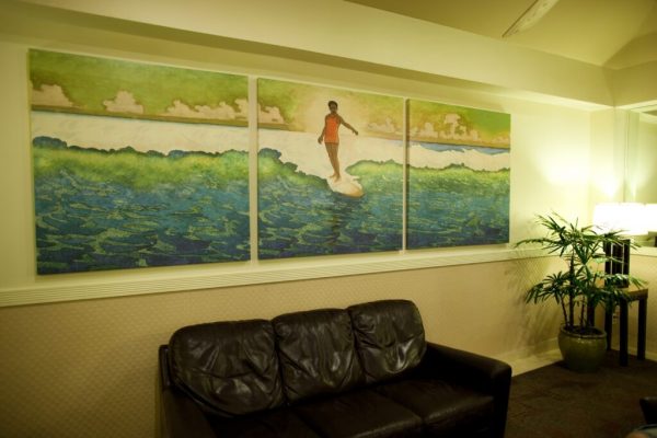 Waikiki Wave Hotel branded with artwork of Charles Bartlett, gallery wrapped giclee on canvas